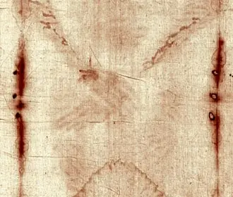 Close view of the crossed hands on the negative, with the wound at the wrist.
