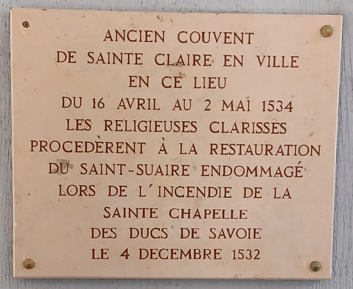 A stone plaque at Chambéry recording the Poor Clares’ repair of the Shroud in 1534.