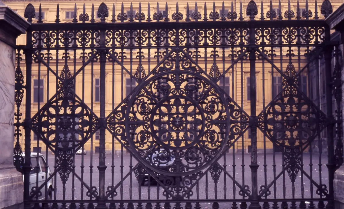 The iron gate between Piazza Castello and the Royal Palace, photographed in 1976.